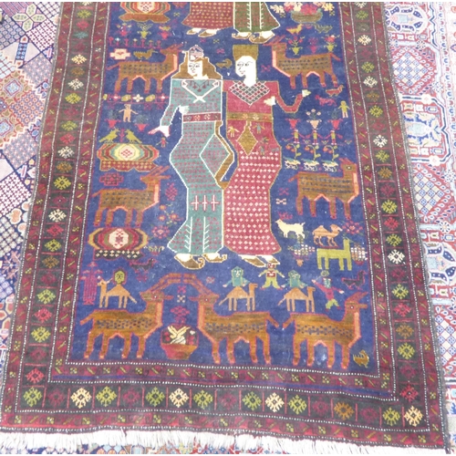 23 - SHIRAZ PERSIAN RUG featuring two male and female couples, on a midnight blue background decorated wi... 