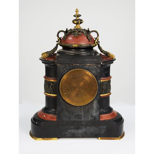 38 - LATE VICTORIAN GILT METAL MOUNTED BLACK SLATE AND RED VEINED MARBLE LARGE MANTLE CLOCK, the 4” Roman... 