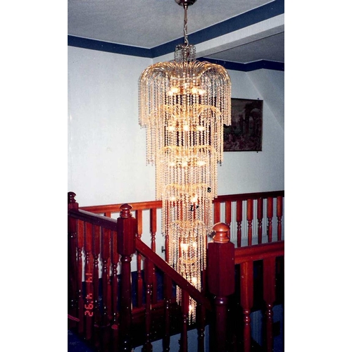 88 - IMPRESSIVE, MODERN GILT METAL AND GLASS TWENTY TWO LIGHT CEILING LIGHT, comprising, six graduating c... 