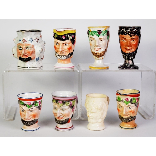 102 - COLLECTION OF EIGHT 18th SATYR MASK MOULDED PORCELAIN CUPS AND JUGS, 5 and 3 respectively, one cup i... 