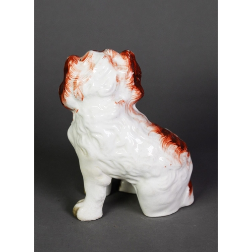 105 - VICTORIAN STAFFORDSHIRE POTTERY MANTEL DOG, modelled with front legs away from the body and with bur... 