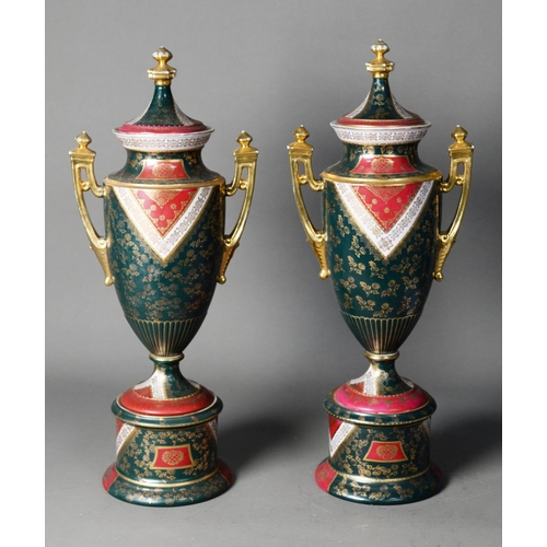 103 - PAIR OF TWENTIETH CENTURY VIENNA STYLE PORCELAIN TWO HANDLED PEDESTAL VASES AND COVERS, each of slen... 