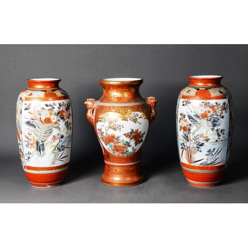 147 - THREE JAPANESE KUTANI PORCELAIN VASES, one of two handled baluster form with bird mask capped handle... 