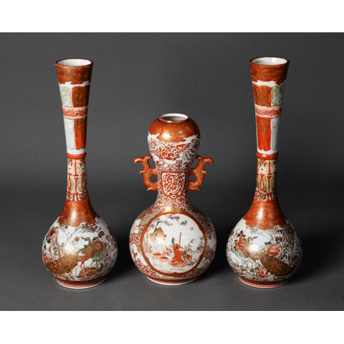 148 - THREE JAPANESE MEIJI PERIOD KUTANI PORCELAIN VASES, one of double gourd for with fancy scroll handle... 