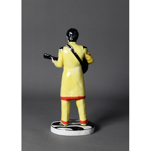 44 - LORNA BAILEY, THE BEATLES, JOHN LENNON CERAMIC FIGURE, in the Sgt Pepper yellow jacket, on a black a... 