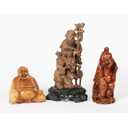 159 - THREE EARLY TWENTIETH CENTURY AND LATER ORIENTAL CARVED WOOD FIGURES, comprising: TWO OF SAGES, ONE ... 