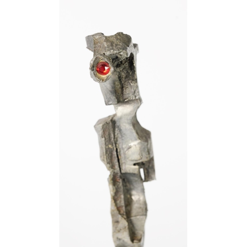 19 - F J AKERS, MODERN CAST METAL AND RED CUT GLASS SCULPTURE, ‘CYCLOPS’, with attributed and titled oblo... 