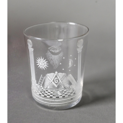 20 - MASONIC SMALL GLASS BEAKER OR SHOT GLASS, with acid etched design, 2 ¾” (7cm) high, together with a ... 