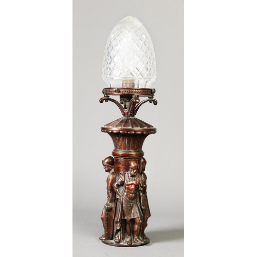 176 - TWENTIETH CENTURY PATINATED SPELTER FIGURAL AND CUT GLASS LAMP BASE, modelled with three standing kn... 