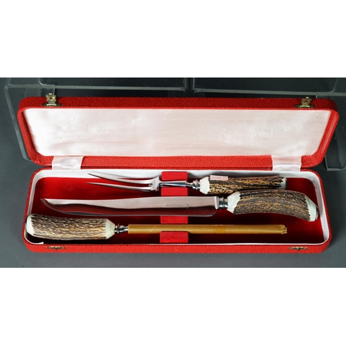 56 - SIPPEL LTD., SHEFFIELD, CARVING KNIFE, FORK AND STEEL, with buckhorn handles, in red morocco case (a... 