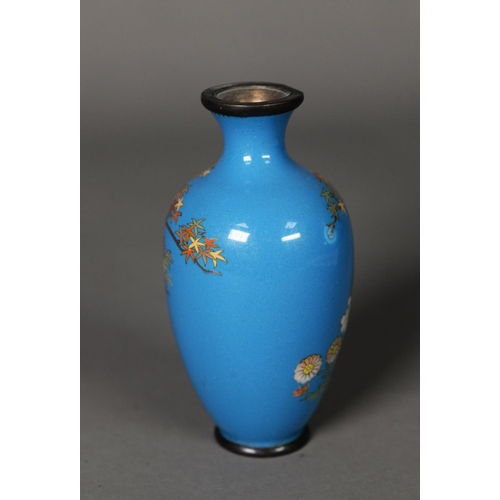 15 - MEIJI PERIDO SMALL OVULAR CLOISONNE VASE decorated with a flowering shrub on a sky blue ground, 4in ... 