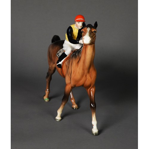 10 - BESWICK GLAZED CHINA BAY RACEHORSE with jockey up, in walking pose, 8 1/2in (21.5cm) high