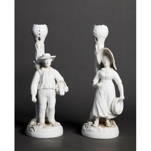 17 - PAIR OF NINETEENTH CENTURY DERBY WHITE GLAZED PORCELAIN FIGURAL CANDLESTICKS, modelled as a rustic c... 