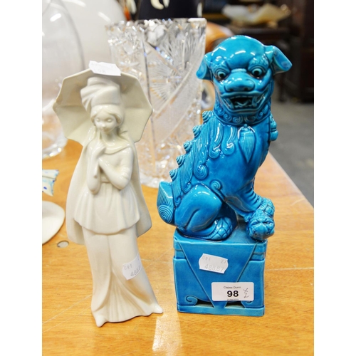 98 - CHINESE BLUE GLAZED POTTERY DOG OF FO ORNAMENT AND AN ITALIAN PORCELAIN FEMALE FIGURE, WITH UMBRELLA... 