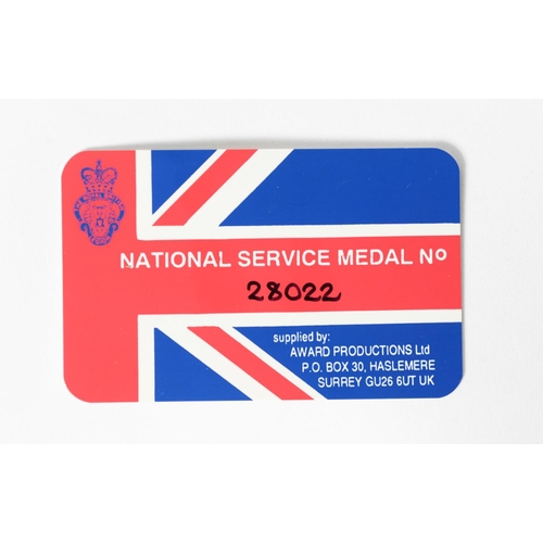 35 - CASED NATIONAL SERVICE MEDAL, with ribbon and plastic card numbered 28022