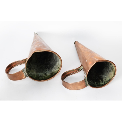 306 - COPPER KITCHEN WARE: A pair of late 19th century copper and brass skilllets, plus two copper grain s... 