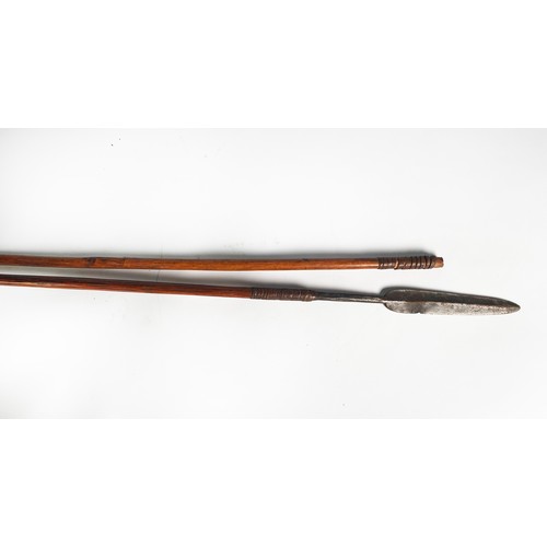 241 - AGED AFRICAN HUNTING SPEAR with iron tip; a similar WOODEN SHAFT ONLY; a snake-form STAFF and a wood... 