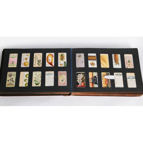 189 - ALBUM OF COMPLETE AND INCOMPLETE SETS OF WILL'S AND PLAYERS CIGARETTE CARDS including Will's locomot... 