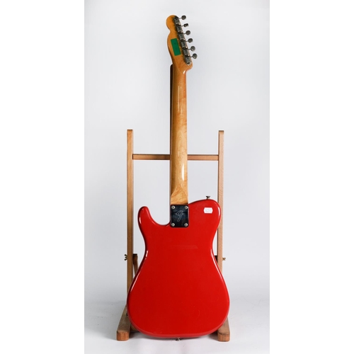 149 - FENDER BULLET STYLE SIX STRING ELECTRIC GUITAR, in red, bears green sticky label to the back of the ... 