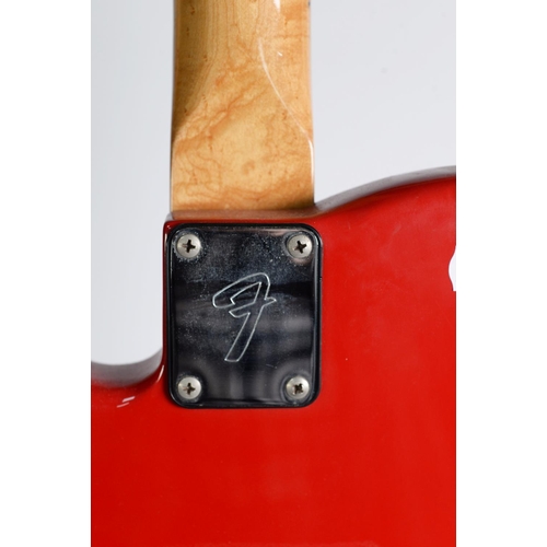 149 - FENDER BULLET STYLE SIX STRING ELECTRIC GUITAR, in red, bears green sticky label to the back of the ... 