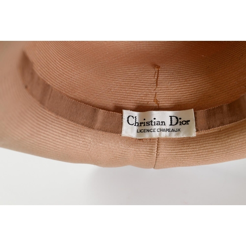 480 - TWO LADY'S HATS each labelled - Christian Dior, Licence Chapeau, one a fawn straw broad brimmed hat,... 