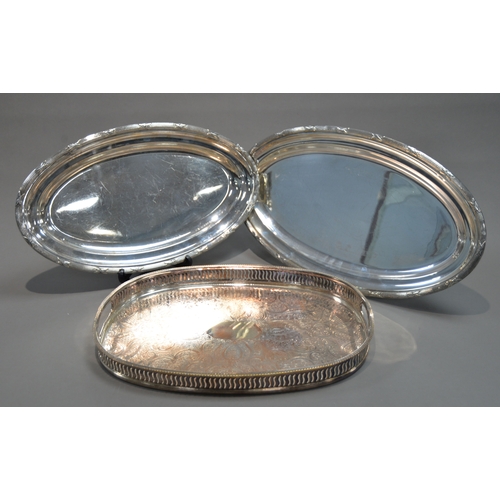 432 - SILVER PLATED ON COPPER TWO HANDLED GALLERIED TRAY, of rounded oblong form with cut-out handles, scr... 