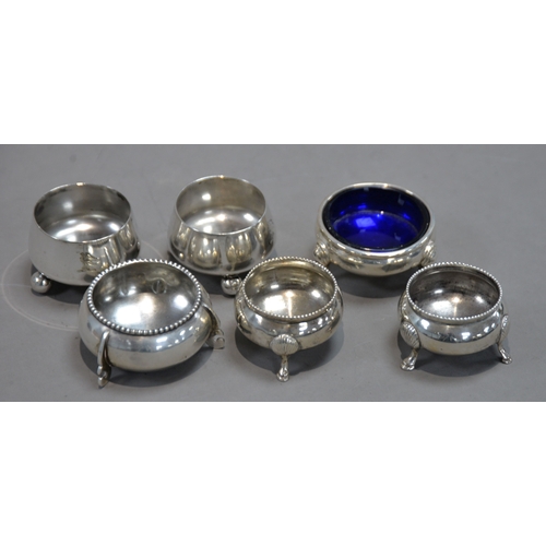 402 - PAIR OF VICTORIAN SILVER CAULDRON-SHAPE SALT-CELLARS with beaded rims, each on three palmette capped... 