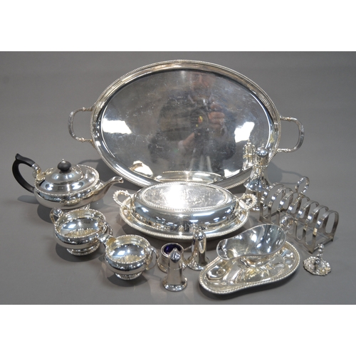 412 - OVAL ELECTRO-PLATED TWO HANDLED TEA TRAY, A PLATED THREE PIECE TEA SERVICE, A GRAVY BOAT ON STAND, A... 