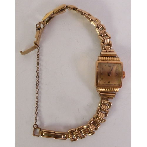 46 - LADY’S 18CT GOLD WRISTWATCH, Swiss 15 jewel movement, square gilt Arabic dial, on a 9ct gold bracele... 