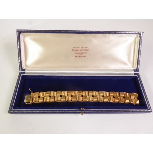 91 - CIRCA 1970S 9CT GOLD BRACELET, of woven textured and brush polished links, import London 1974, 2cm b... 