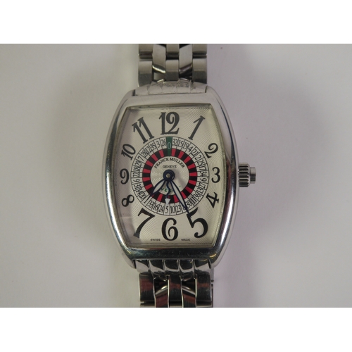 11 - FRANCK MULLER, GENEVE, 'VEGAS 5850' GENTLEMAN'S STAINLESS STEEL TONNEAU FORM WRIST WATCH, with autom... 