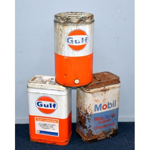 276 - AUTOMOBILIA: Gulf Lubricants oil drum, Gulf oil can, and a Mobil Oil can, each approx. 19