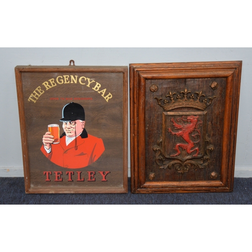 223 - SIGNAGE: Two rectangular vintage pub decorating signs, 'The Regency Bar' and another of a sigil bear... 