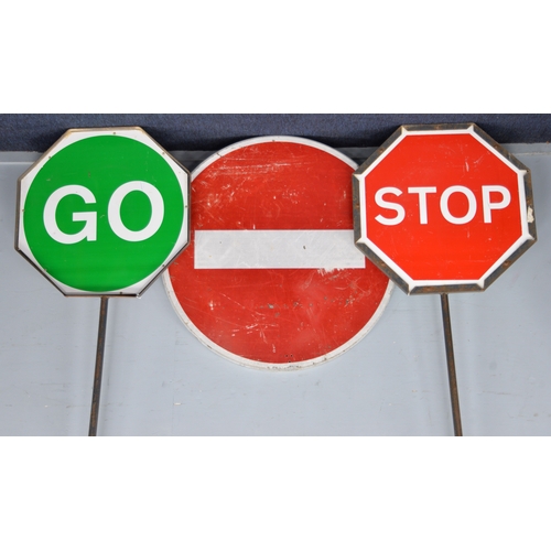 271 - SIGNAGE: Pair of vintage Ministry of Transport octagonal STOP/GO signs on heavy steel poles, plus a ... 