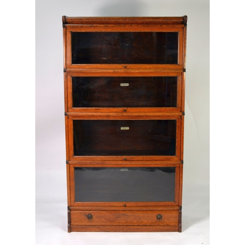 75 - BARRISTER'S BOOKCASE: 1920s Globe Wernicke oak sectional bookcase, complete with single drawer base,... 