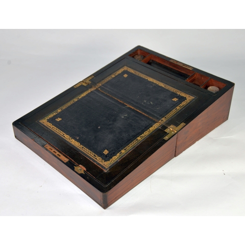 44 - NINETEENTH CENTURY BRASS MOUNTED AND LINE INLAID WALNUT PORTABLE WRITING SLOPE, of typical form, the... 