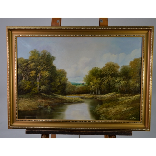 101 - ANDREW GRANT KURTIS (20TH CENTURY), oil on canvas of a woodland lake with fields behind, signed lowe... 