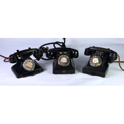 249 - THREE BLACK CASED, ROTARY DIAL VINTAGE BAKELITE TELEPHONES, comprising one with four push buttons to... 