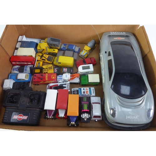 239 - HITARI CHINESE PLASTIC REMOTE CONTROLLED BATTERY OPERATED JAGUAR XC 220 and the remote control box; ... 