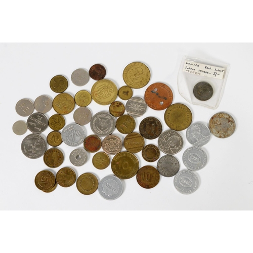 338 - TOKENS: A collection of mainly 20th century tokens including Peak Freans Teddy Bear Biscuits alloy t... 