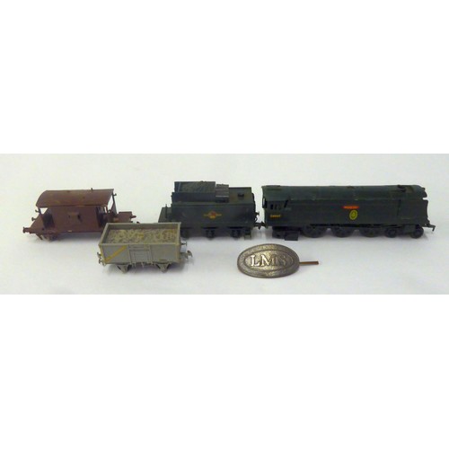 241 - GREEN PUSH-ALONG LOCOMOTIVE no 34057 with coal tender and two plastic wagons; a metal LMS OVAL CAP B... 