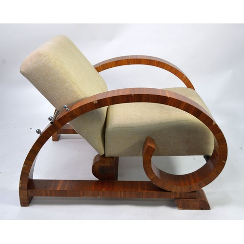 55 - ART DECO LOUNGE ARMCHAIR, with reclining back, the back and seat upholstered and cover in fawn cloth... 