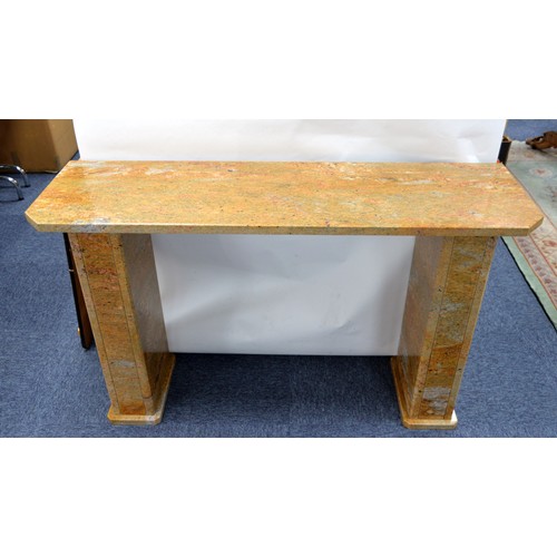 79C - RECONSTITUTED FAWN AND SPECKLED MARBLE SIDE TABLE with gold dusting, shallow oblong with canted fore... 