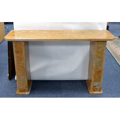 79C - RECONSTITUTED FAWN AND SPECKLED MARBLE SIDE TABLE with gold dusting, shallow oblong with canted fore... 