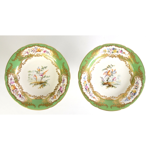 119 - 19th CENTURY COALPORT CHINA PAIR OF PEDESTAL DESSERT DISHES, the bowls painted with exotic birds on ... 