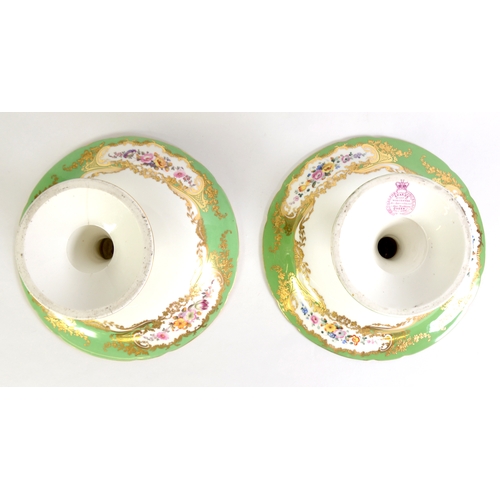 119 - 19th CENTURY COALPORT CHINA PAIR OF PEDESTAL DESSERT DISHES, the bowls painted with exotic birds on ... 