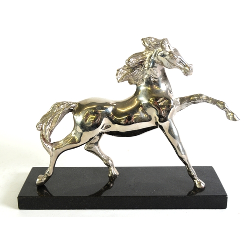 8 - SILVER PLATED MODEL OF A GALLOPING HORSE, on black marble oblong base, 8in (20.5cm) high overall, 10... 