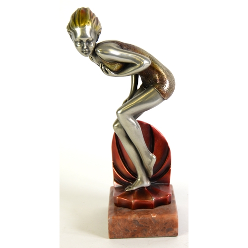 6 - SILVER AND GILT PATINATED METAL ART DECO FEMALE FIGURE wearing a swimming costume, in crouching pose... 