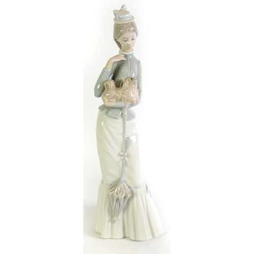 90 - LLADRO PROCELAIN TALL FIGURE of a lady carrying two pekingese dogs 14 1/2