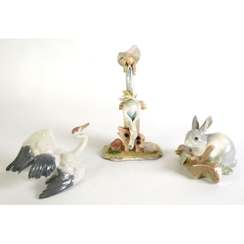 97 - LLADRO MODEL OF A RABBIT behind a log 3 1/4